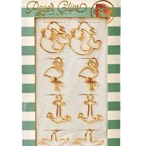 Eight gold coastal paper clips